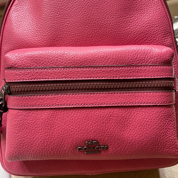 Coach Handbags - Coach medium backpack..pink